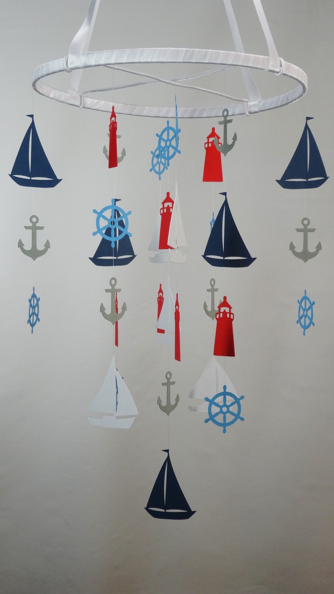 Nautical Mobile With Sailboat, Anchor, Helm And Lighthouse